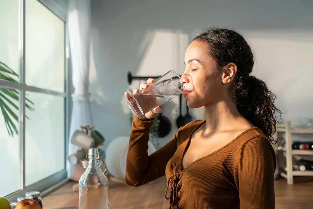 Woman drinking filtered water